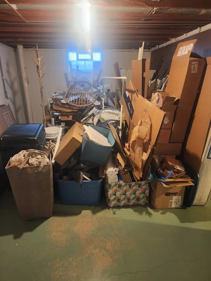 Roll-off dumpster container at job site for 4 Yard Dumpster Rental in Erie