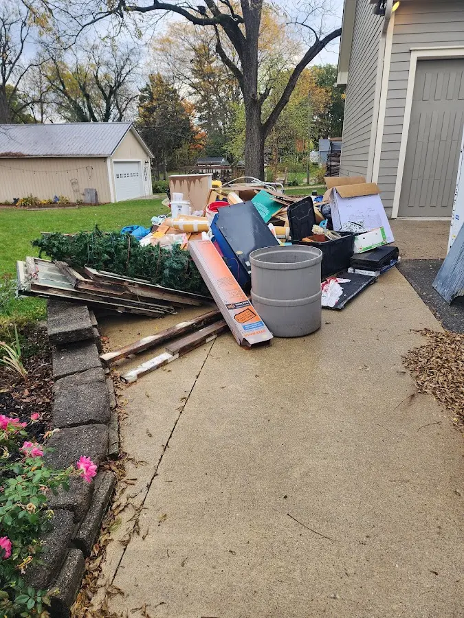 Dumpster being loaded with debris for 3 Yard Dumpster Rental in Erie